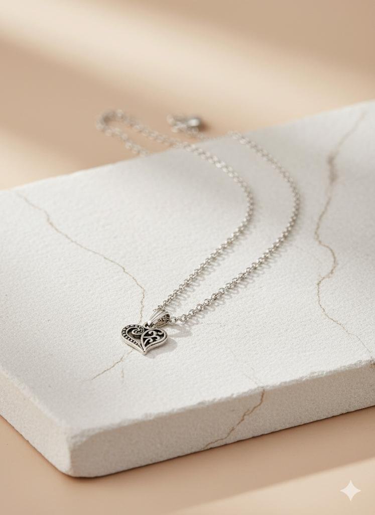 WhatsApp Image 2025-09-27 at 3.20.17 PM Ornate Filigree Sterling Silver Heart Pendant Necklace" Other descriptive names could include: Vintage-Style Oxidized Silver Heart Necklace Bali-Style Detailed Heart Pendant Necklace Sterling Silver Scrollwork Heart Charm Necklace